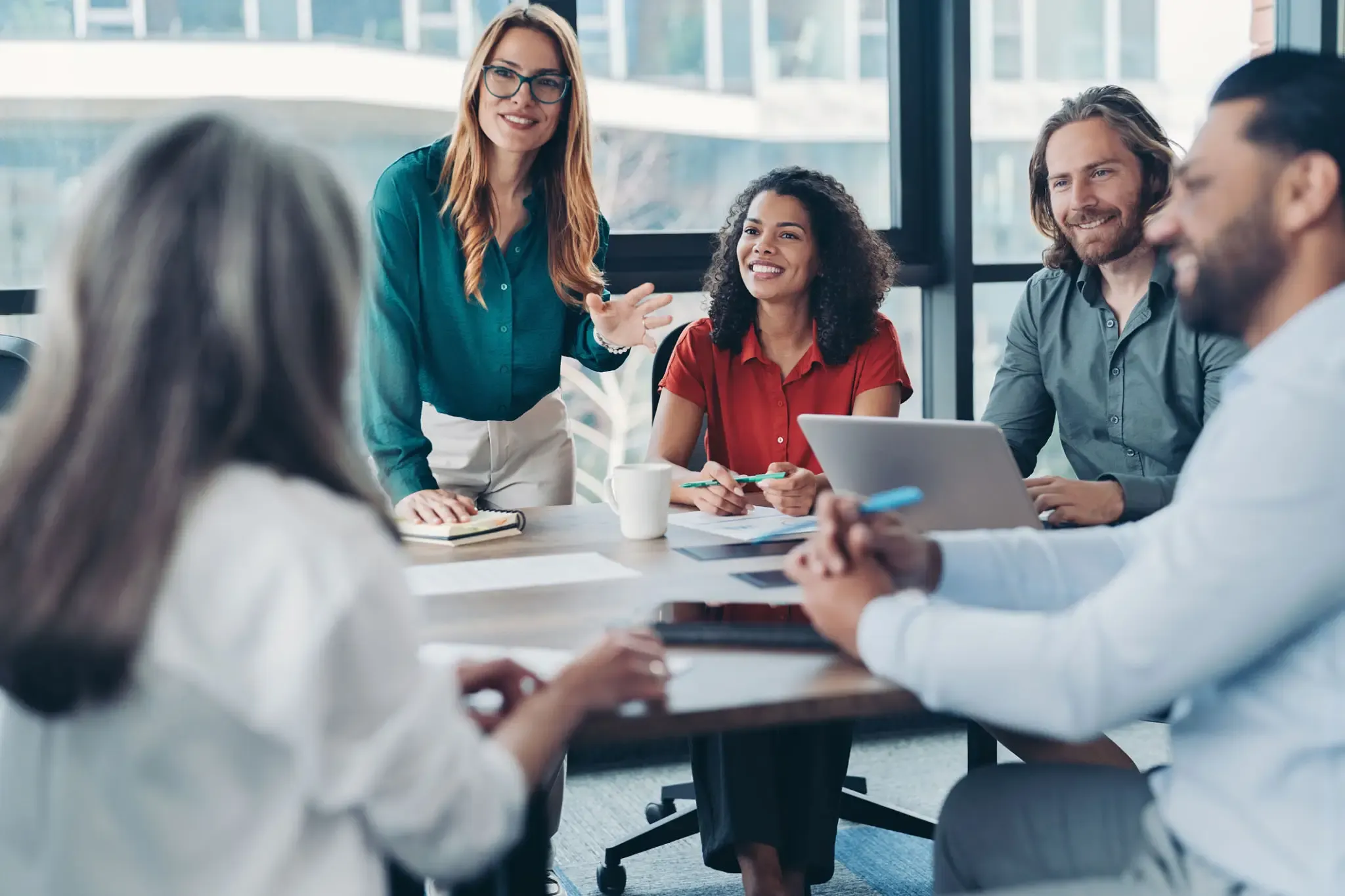 Team collaborating in a modern office setting.