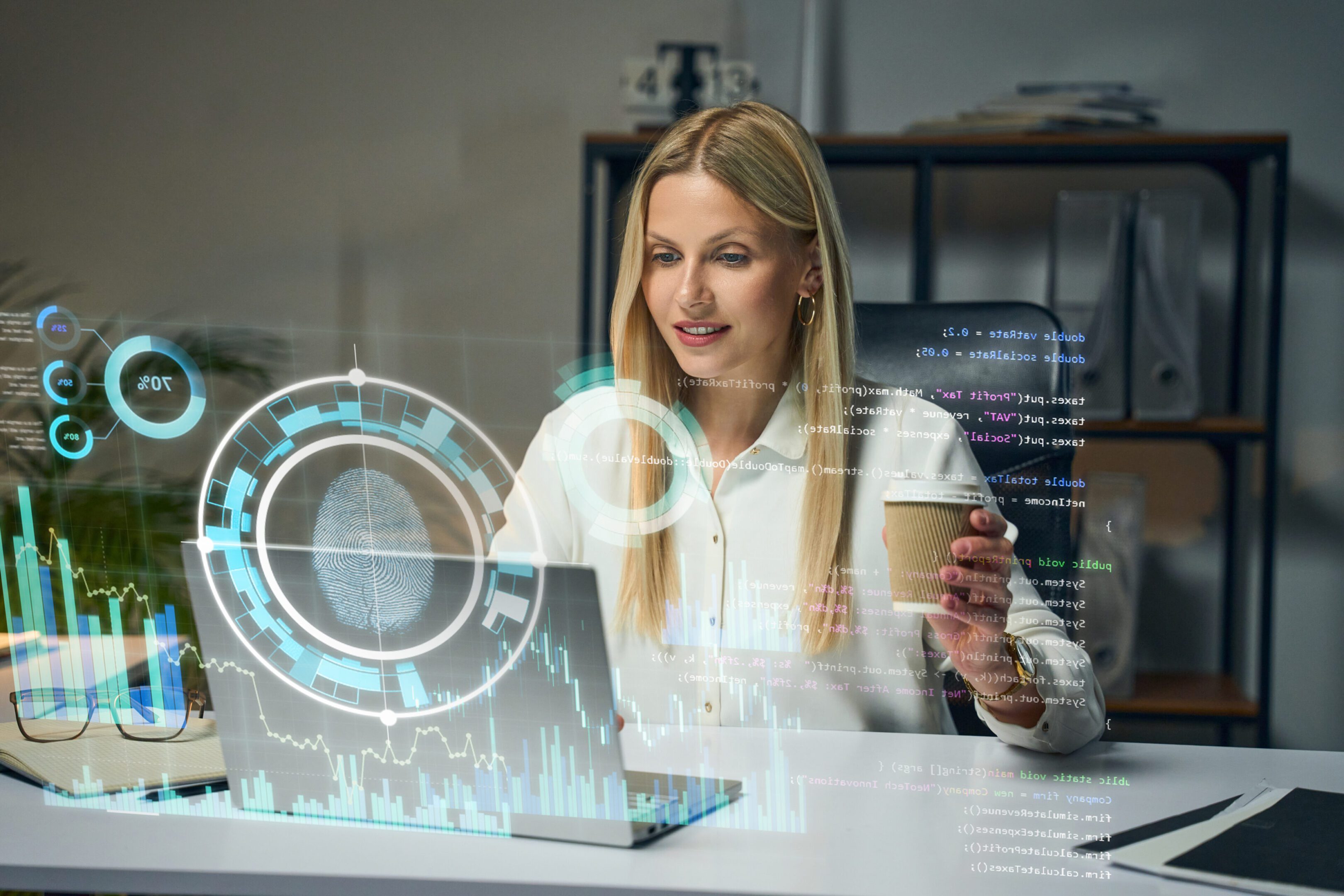 A woman interacts with futuristic holographic technology at her desk.